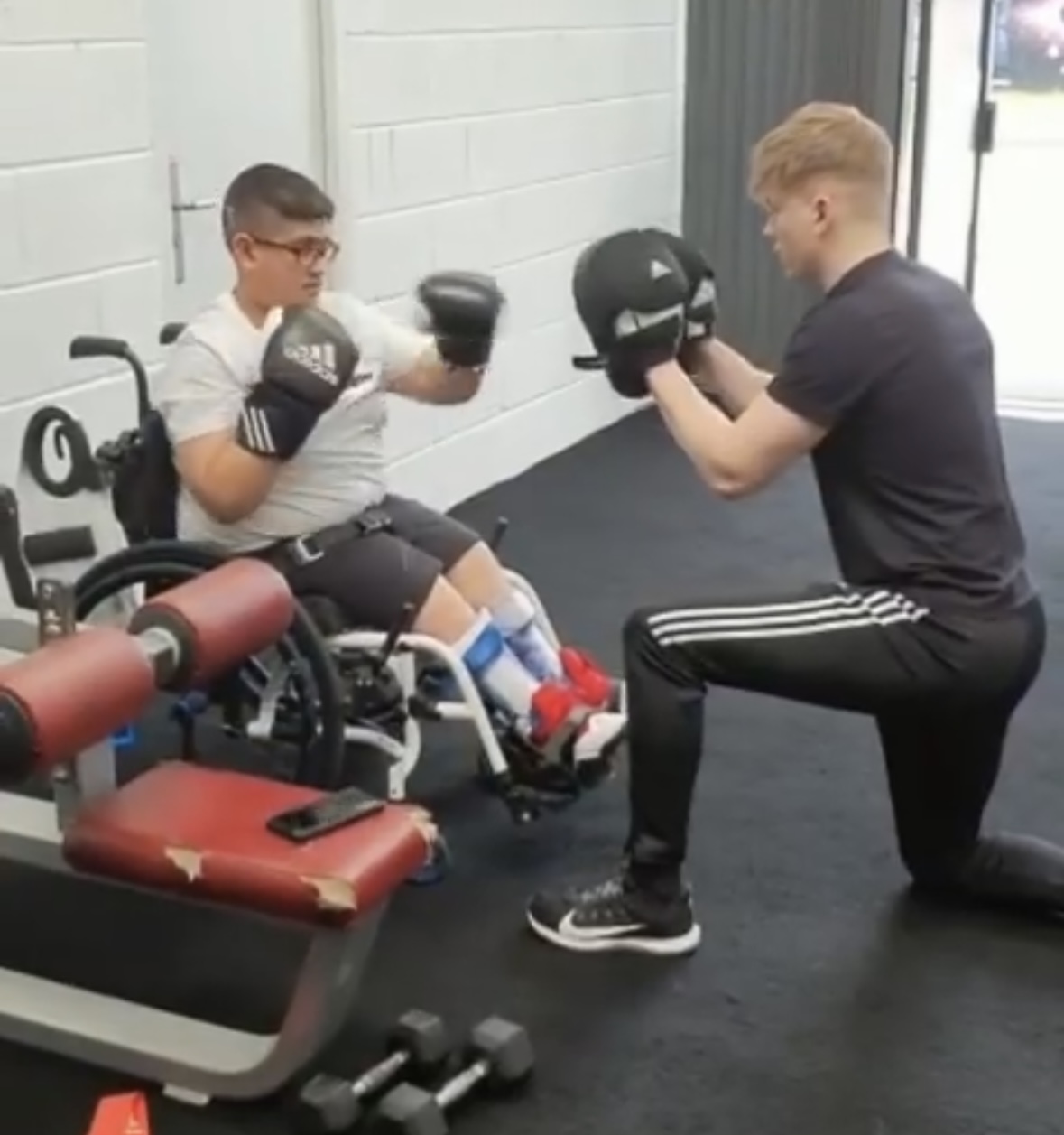 George Vernon coaching in the gym